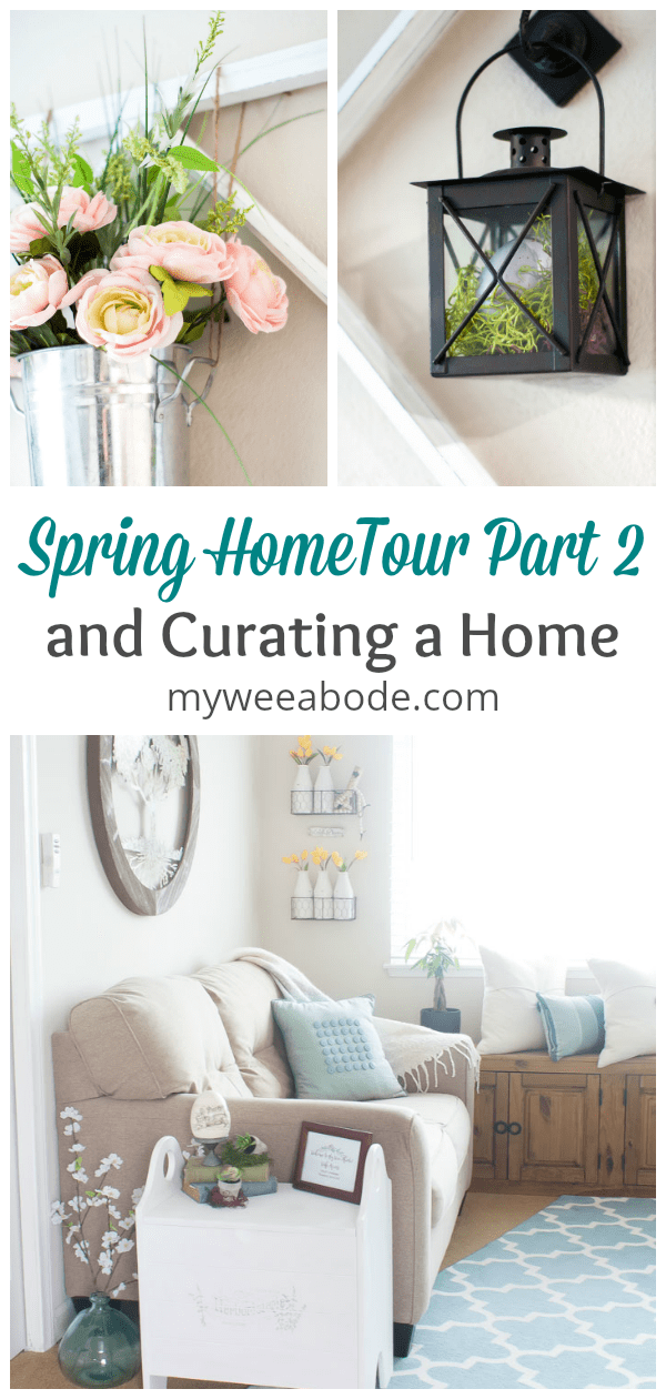 spring home tour part 2 curating a home pink yellow flowers in metal vase black lantern with egg view of living room with love seat and spring decor