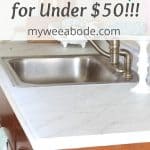 diy cheap countertops contact paper kitchen with wood cabinets and marble look countertop with cutting board and bowl with linens