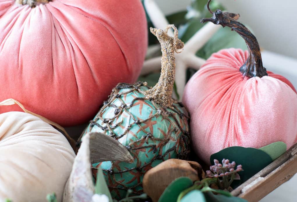 diy velvet pumpkins just like the pros velvet pumpkins in coral aqua and natural in a tobacco basket with leaves flowers and natural elements and decoupaged pumpkin with fishnet and sand covered stem
