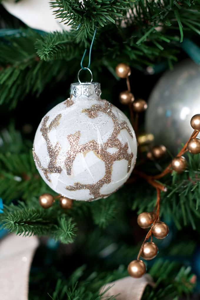 big ideas for decorating a small christmas tree with coral sparkly ornament