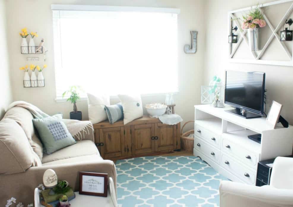 one year blogiversary small home giveaway living room with furniture and big window with aqua rug