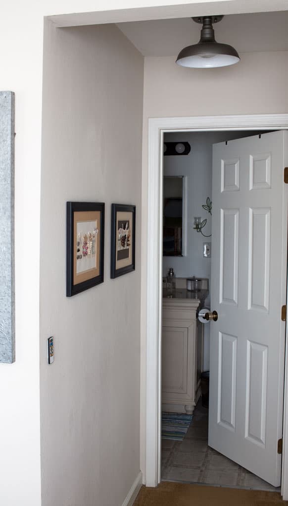 quick farmhouse makeover outdated frames two pieces of art on wall