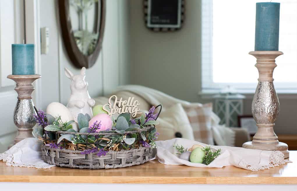 spring centerpiece velvet easter eggs centerpiece with wooden bowl florals eggs and bunny on table with candlestick