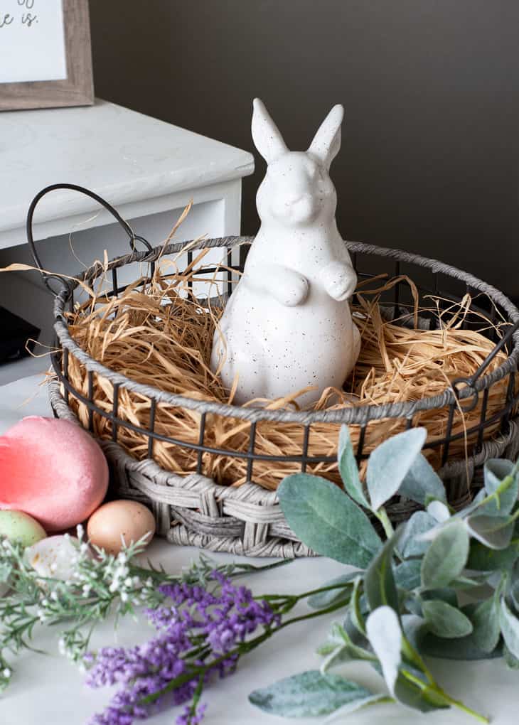 spring centerpiece velvet easter eggs centerpiece with wooden bowl florals eggs and bunny on table with candlestick