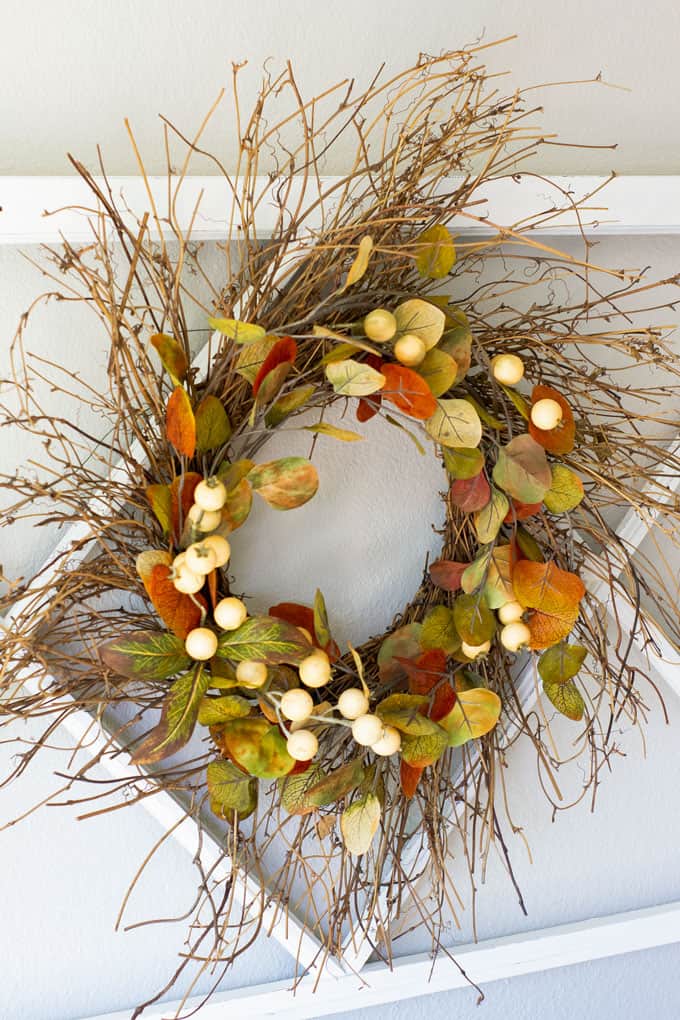 quick easy rustic fall wreath hanging on wall