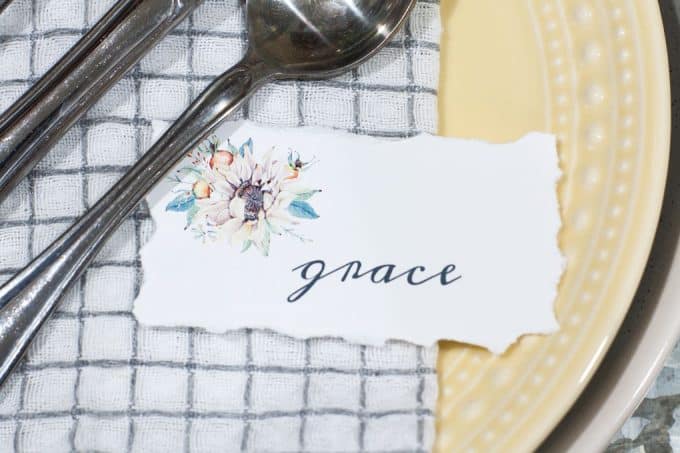 silverware setting on napkins with name place card