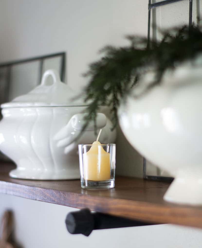 love your dark kitchen cabinets with winter neutrals ironstone tureen with wreath and yellow candle
