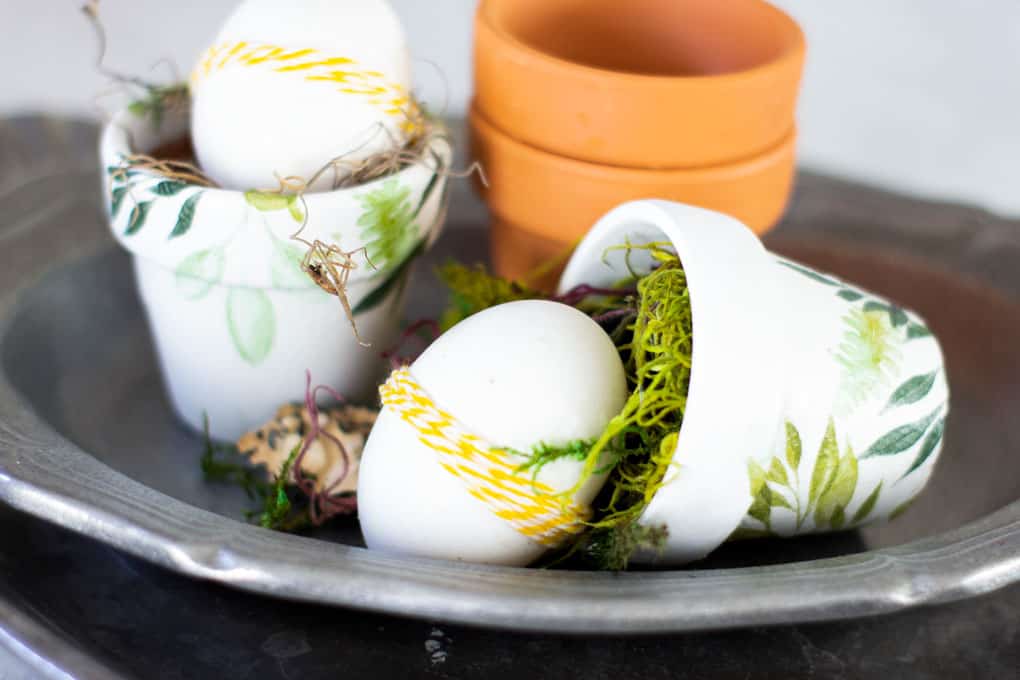 mod podge terra cotta pot with eggs on pewter platter