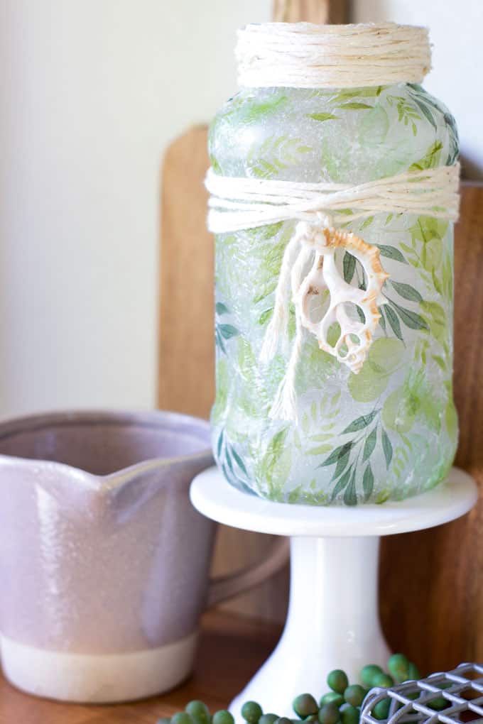 fresh spring vignette with coordinating tealight holder and terra cotta mini pots