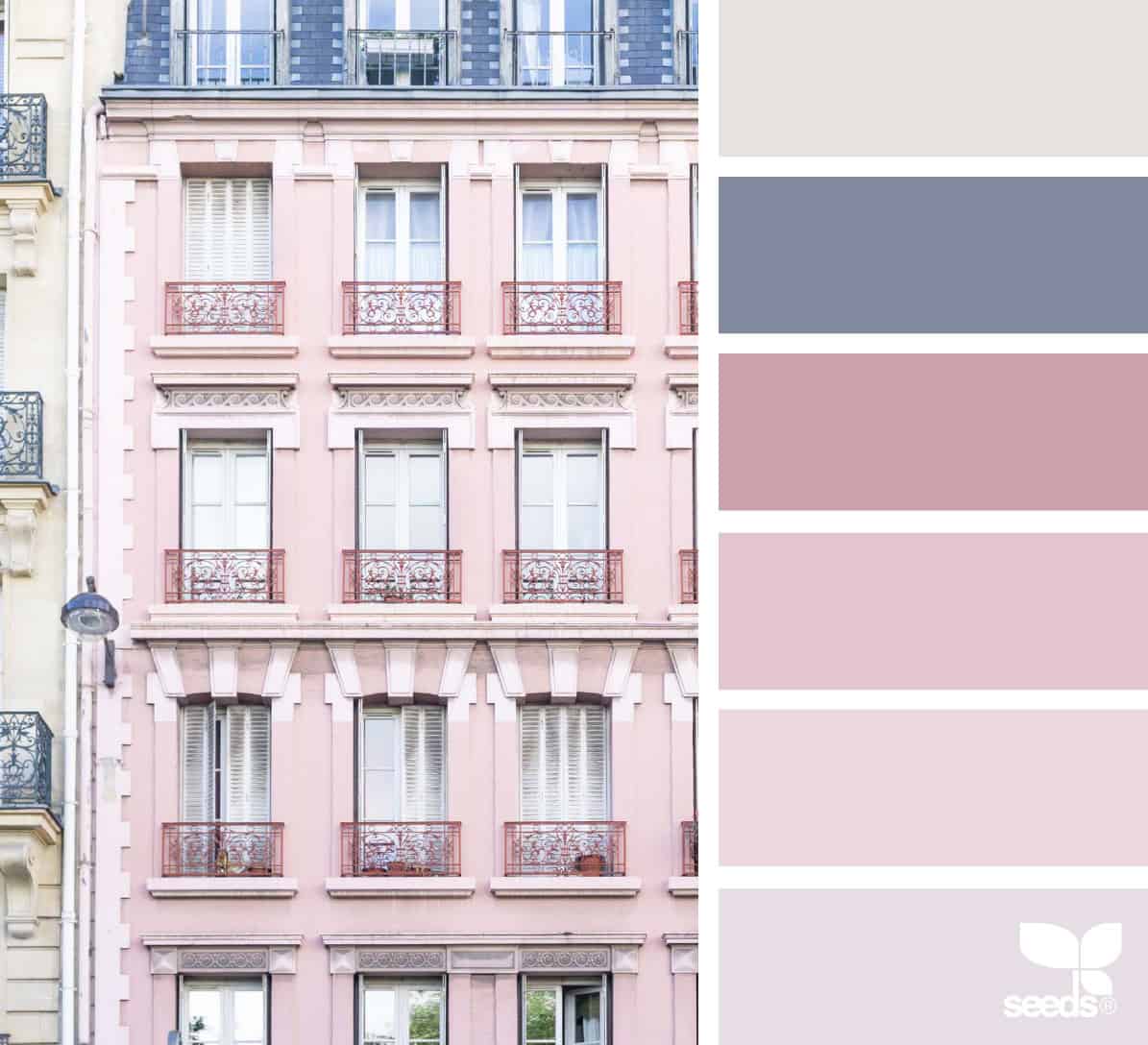 tall pink building with blue roof and color palette