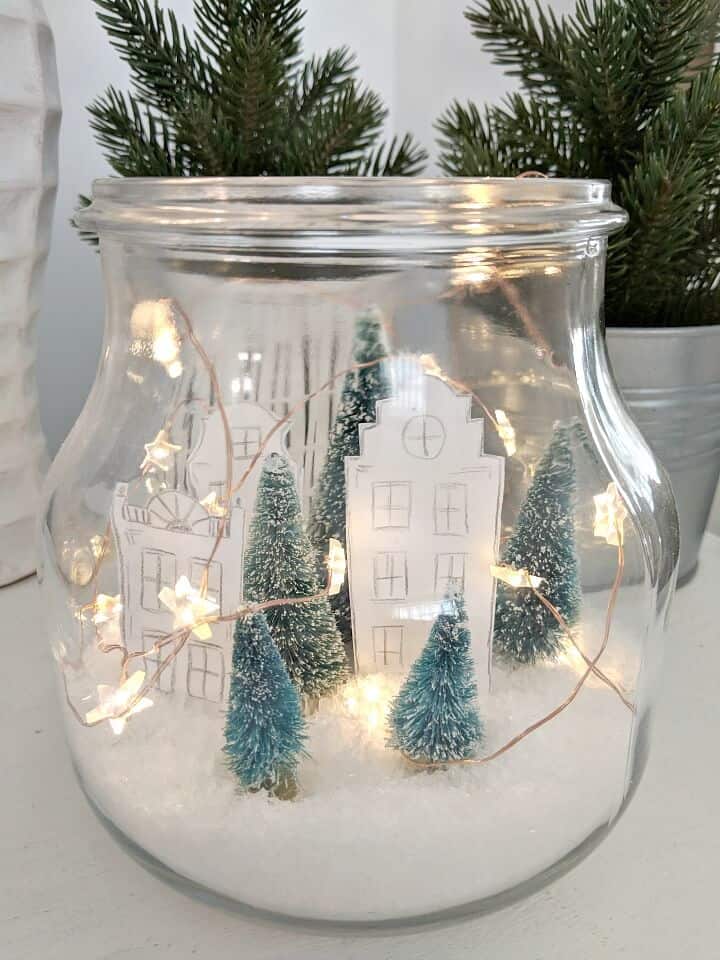 fairy light candle holder jar with houses and trees with twinkle lights