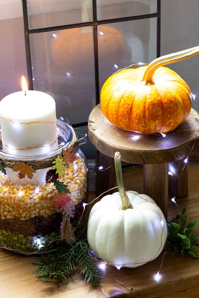 twinkle light candle holder with pumpkins