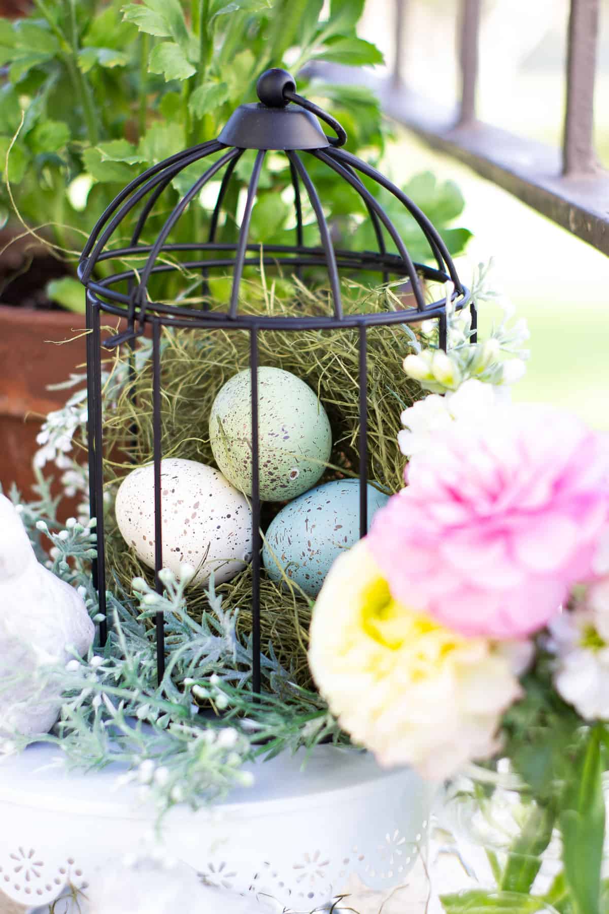 spring bird cage pinterest challenge vignette with bird cage and spring elements