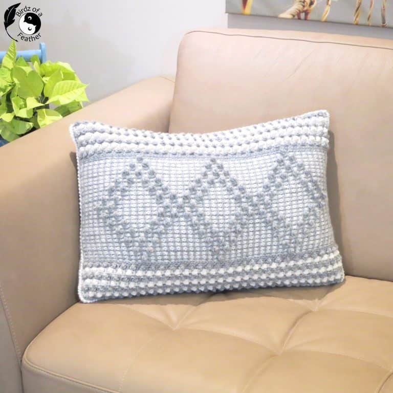 crocheted boho pillow cover on sofa