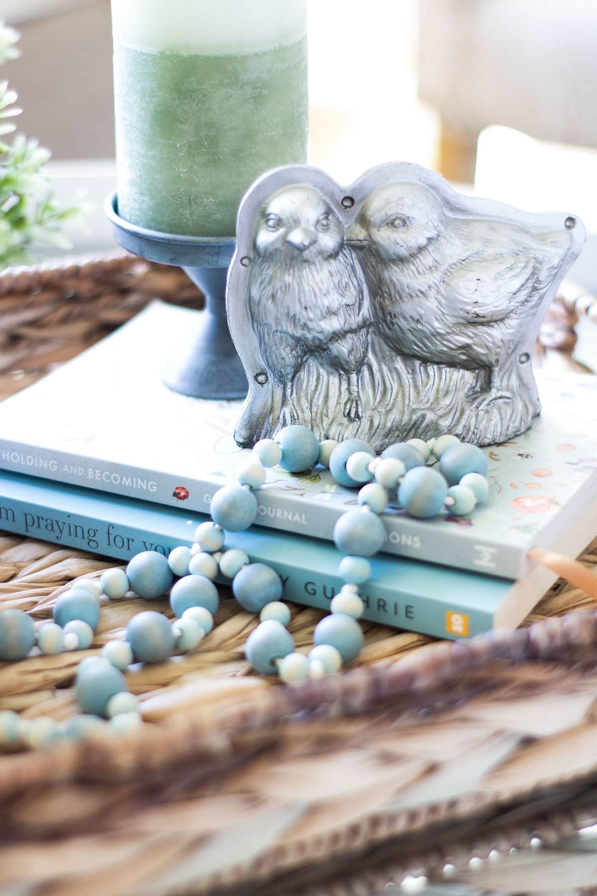 small living room update and spring tour chick mold with wood beads and books in tray