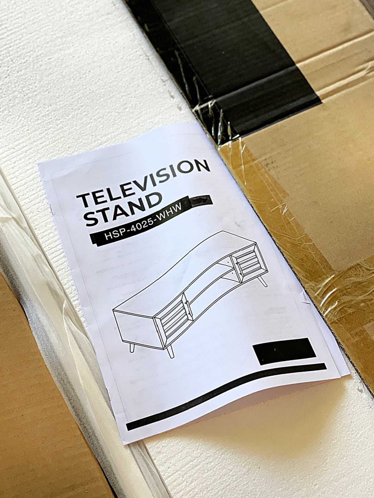 television stand instructions taped to box