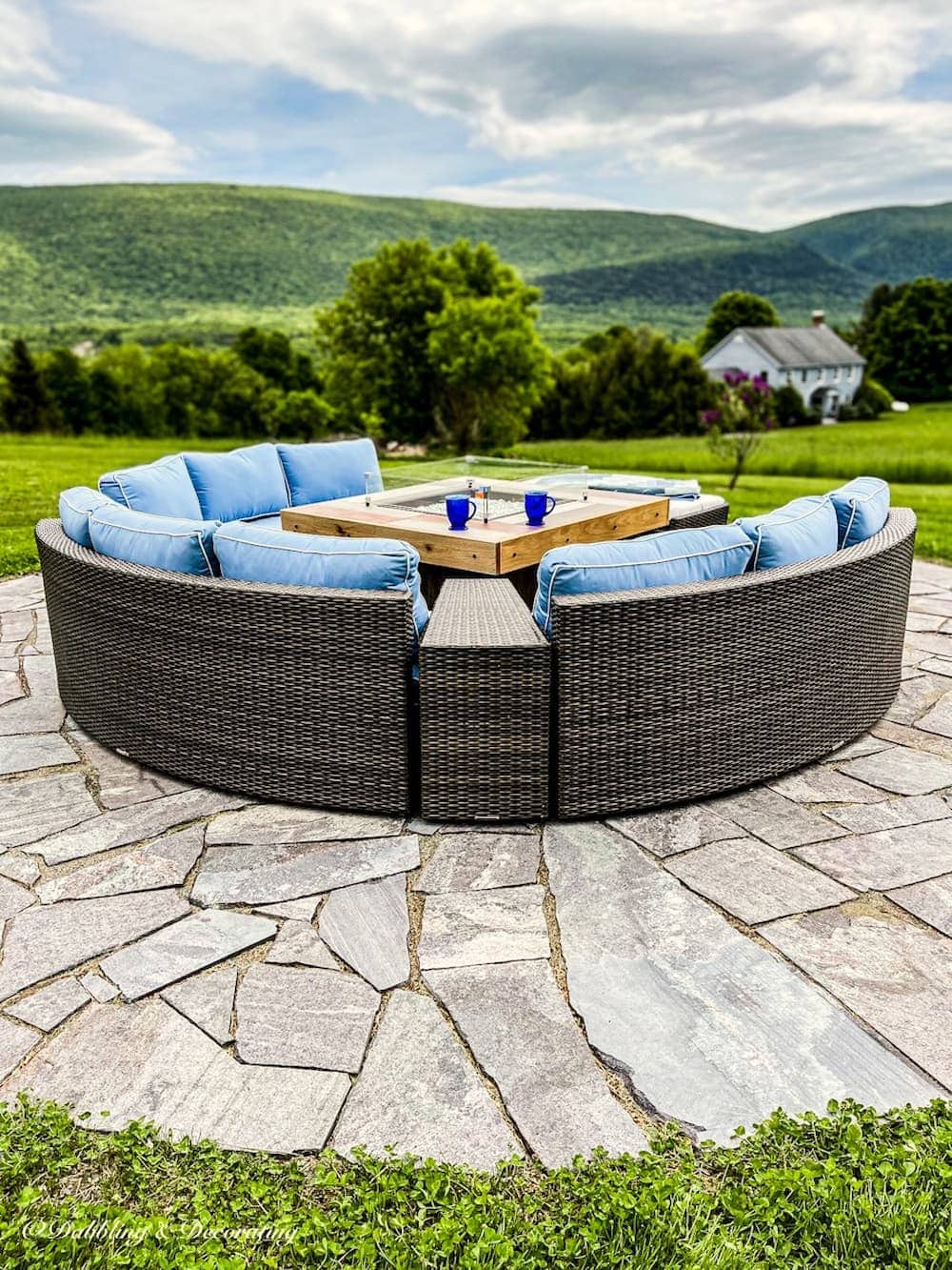 outdoor space with firepit and conversation furniture with vermont background