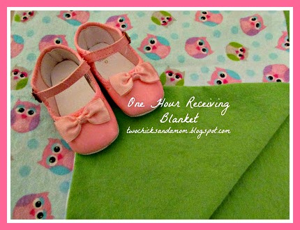 receiving blanket and pink shoes