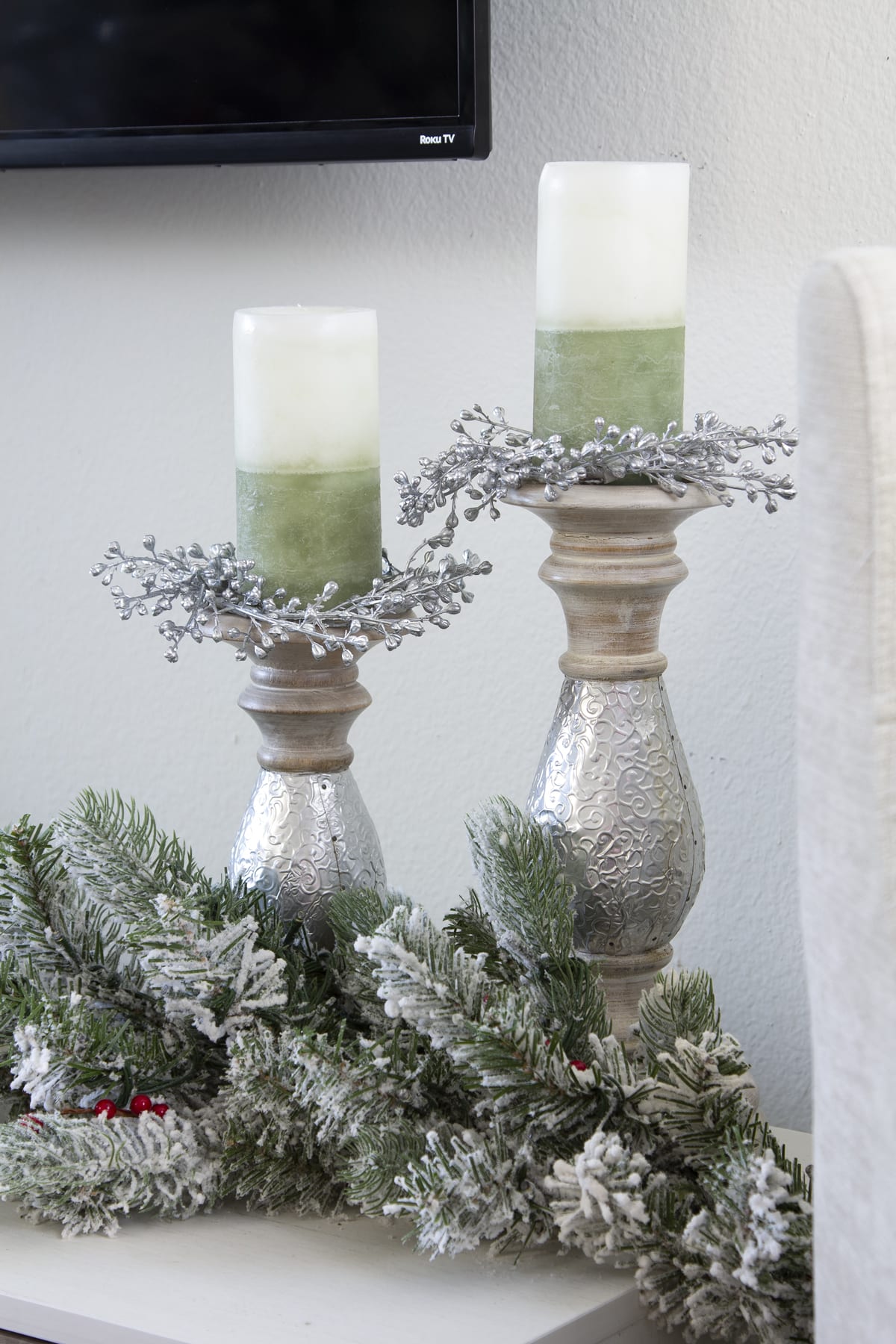 a tiny home christmas tour garland and candles