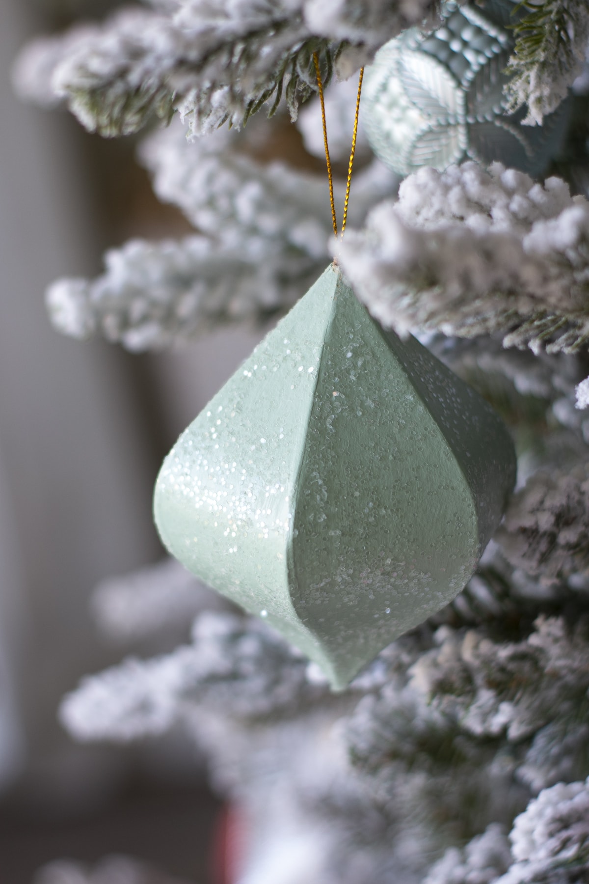 mint ornament in christmas tree