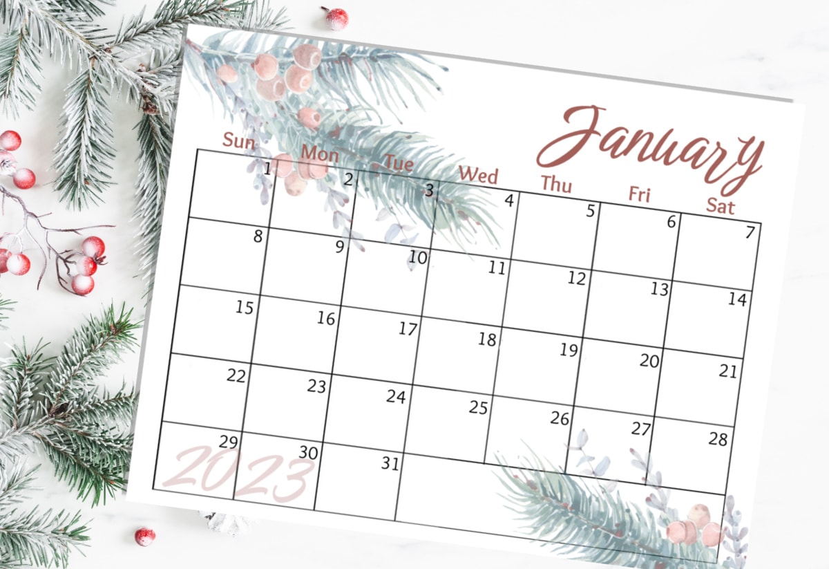 free 2023 watercolor calendar printable image of January calendar with pine and berries in backgound