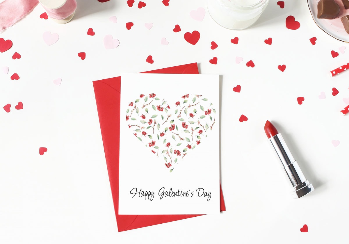 free watercolor valentine heart card on surface with hearts and lipstick