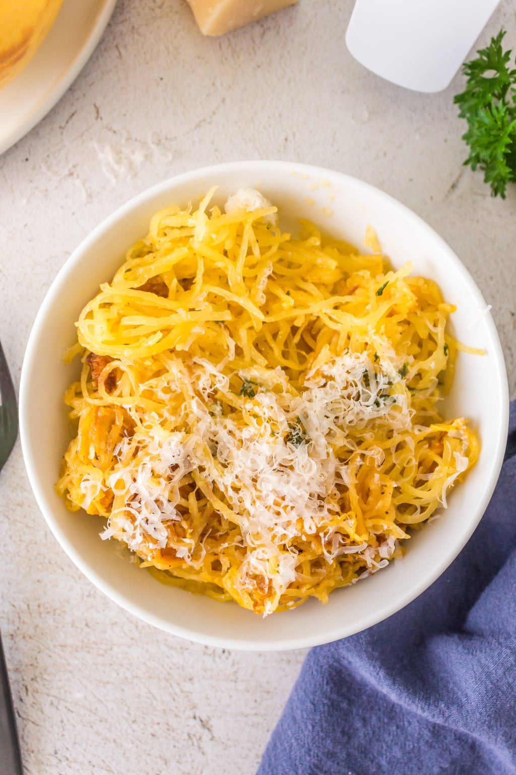 tuesday turn about 183 savor the new year spaghettie squash in white bowl with parmesan