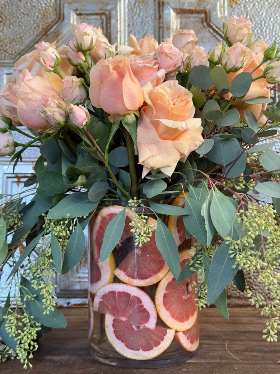 tuesday turn about 189 february florals rose arrangement with citrus slices