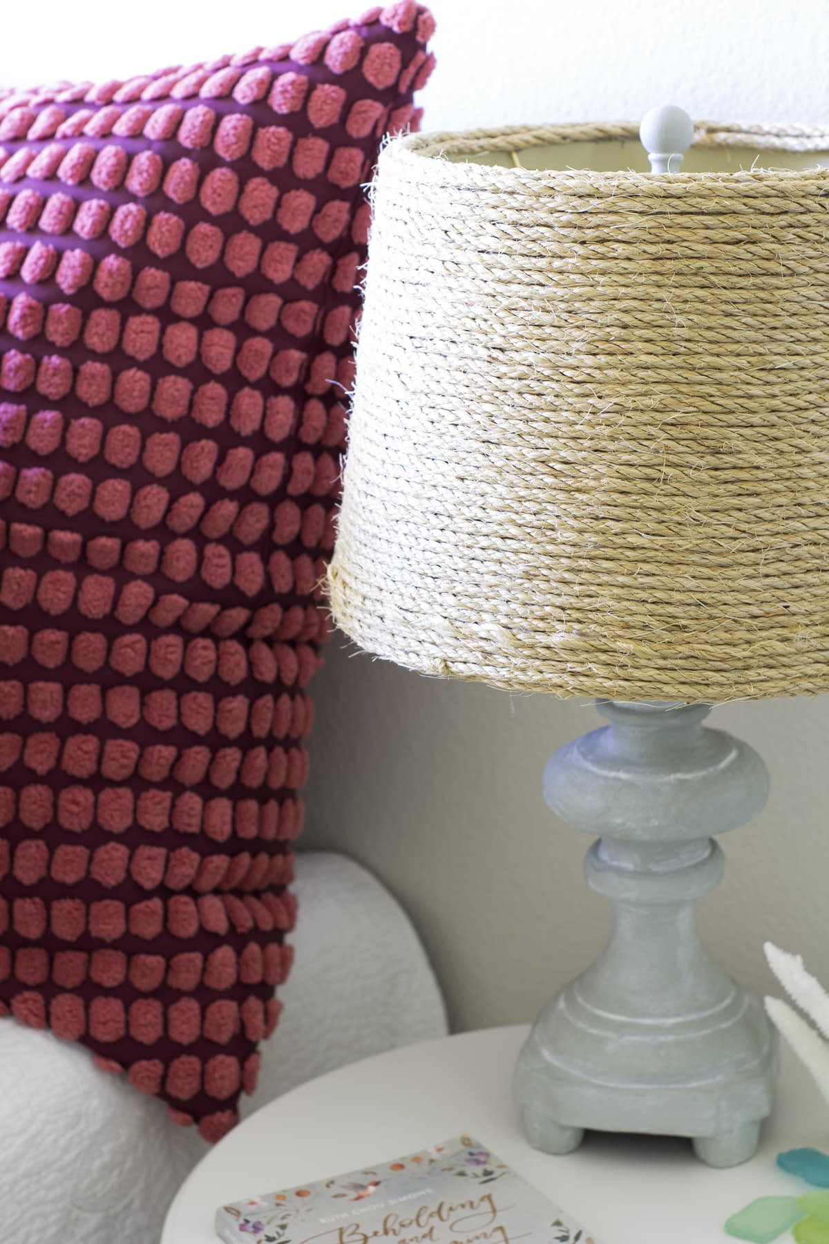 easy diy woven lamp shade with jute cord cement lamp with woven shade on nightstand in bedroom with bed and pillows