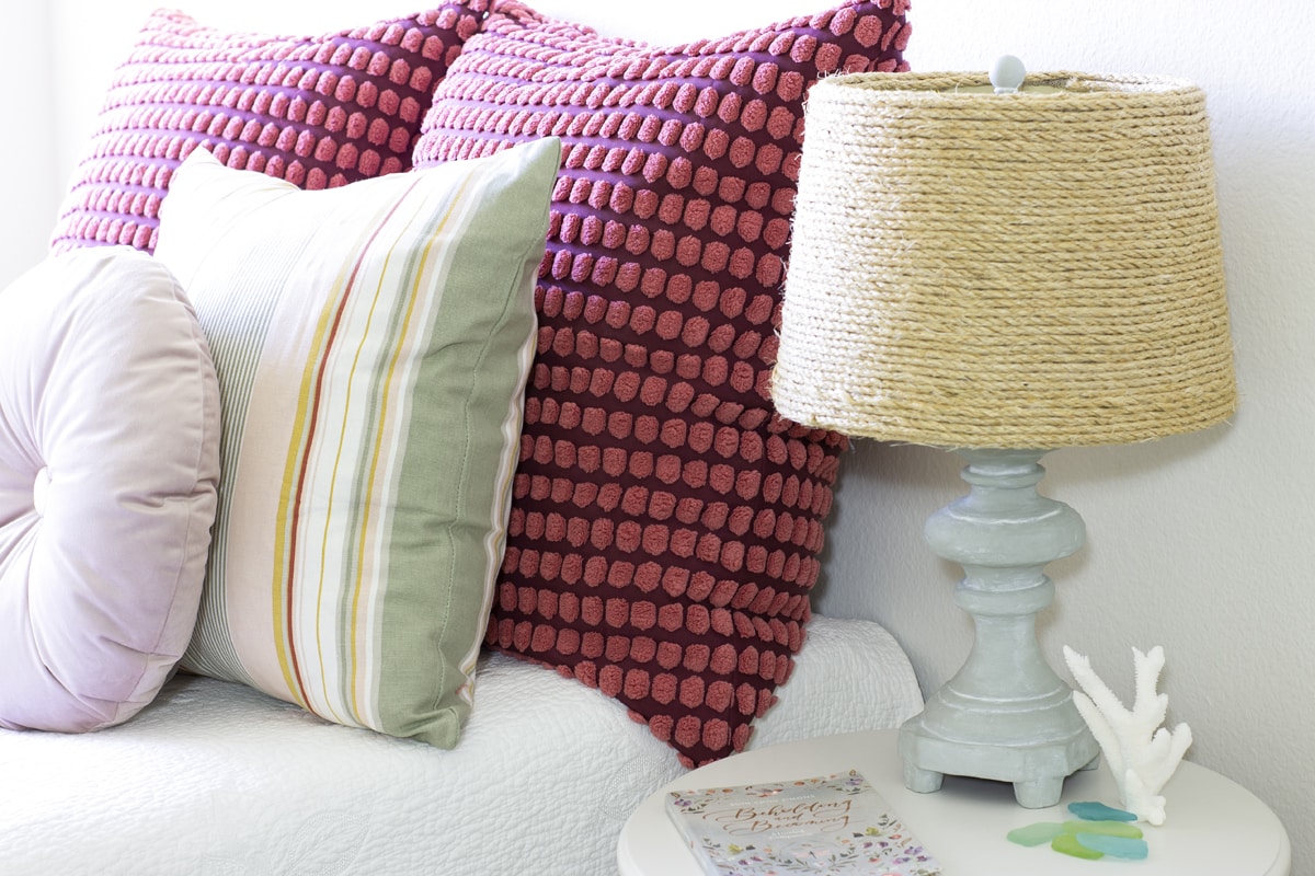 easy diy woven lamp shade with jute cord cement lamp with woven shade on nightstand in bedroom with bed and pillows