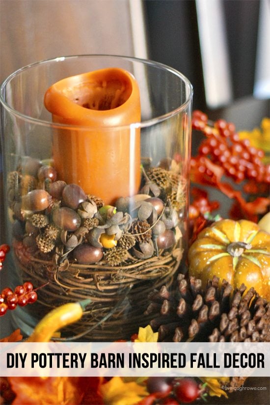 early fall vignette for a small coffee table hurricane lamp with orange candle and fall elements