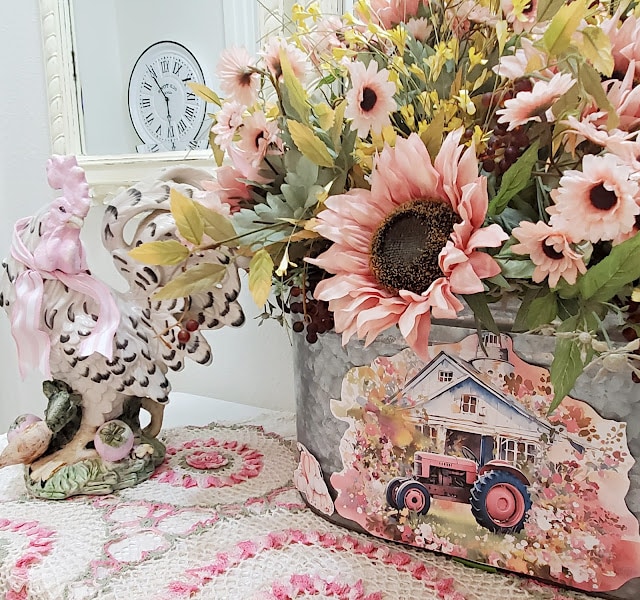 floral arrangement with pink sunflowers and shabby chic decor elements