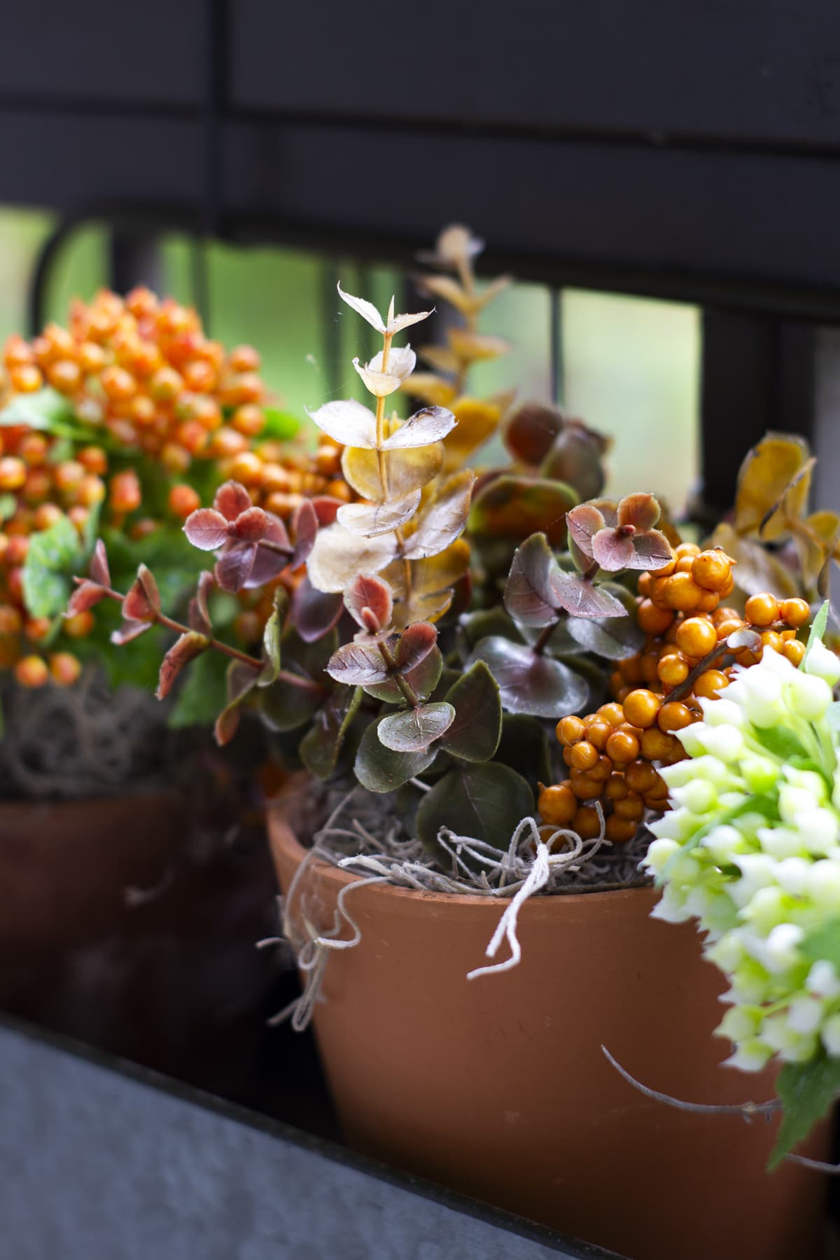 how to decorate your cozy apartment with fall faux florals in window box