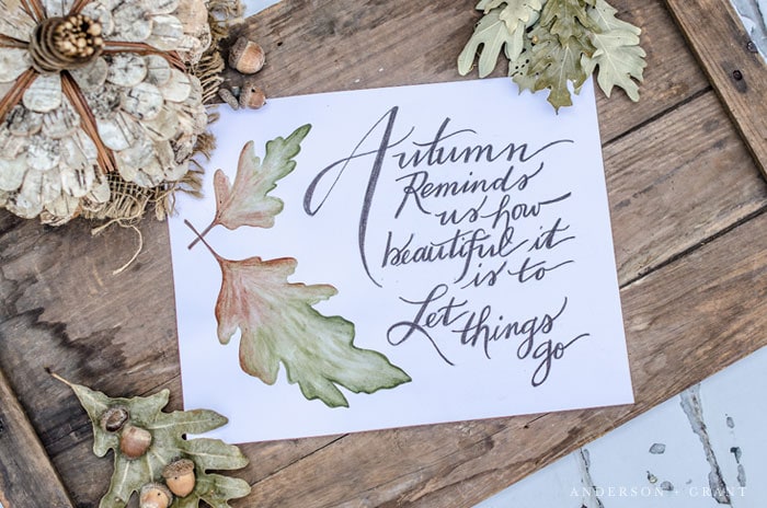 fall leaf printable with wording on paper and setting on wood surface