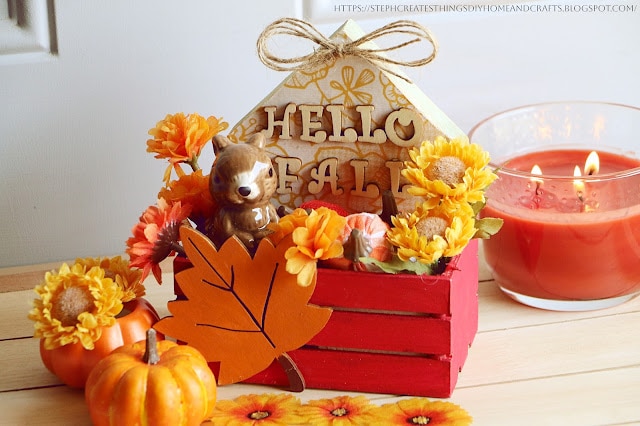 tuesday turn about 218 arriving and leafing fall crate decor with red and orange elements and little squirrel
