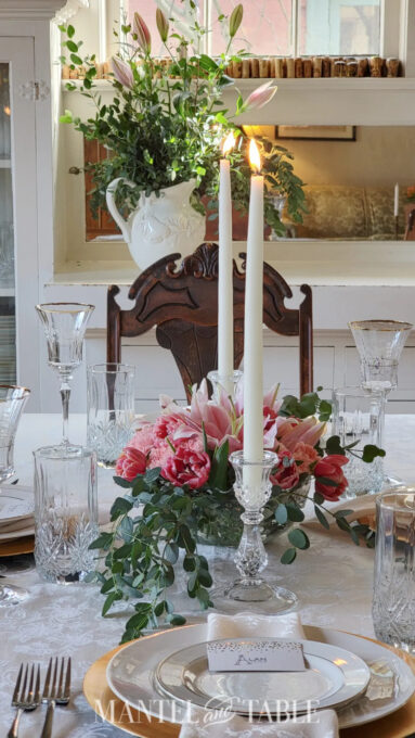 romantic tablescape with flowers and candlelight