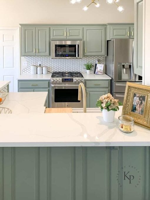 sage green cabinet paint colors kitchen with open shelving and kitchen items displayed